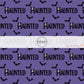 Purple fabric by the yard with phrase "Haunted" and black flying bats.