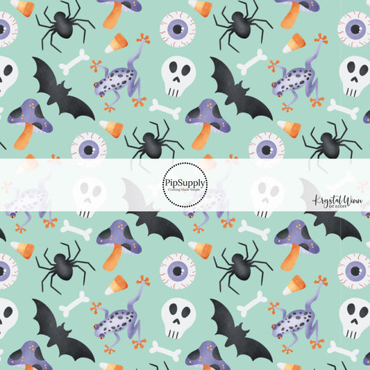 These Halloween themed blue fabric by the yard features bats, skulls, eyeballs, spiders, and candy on light blue. This fun spooky themed fabric can be used for all your sewing and crafting needs! 