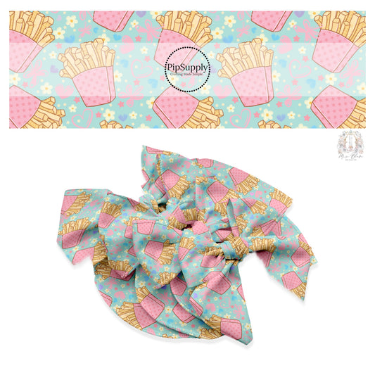 These Valentine's pattern no sew bow strips can be easily tied and attached to a clip for a finished hair bow. These Valentine's Day bow strips are great for personal use or to sell. The bow strips feature fries surrounded by hearts and flowers on light blue. 