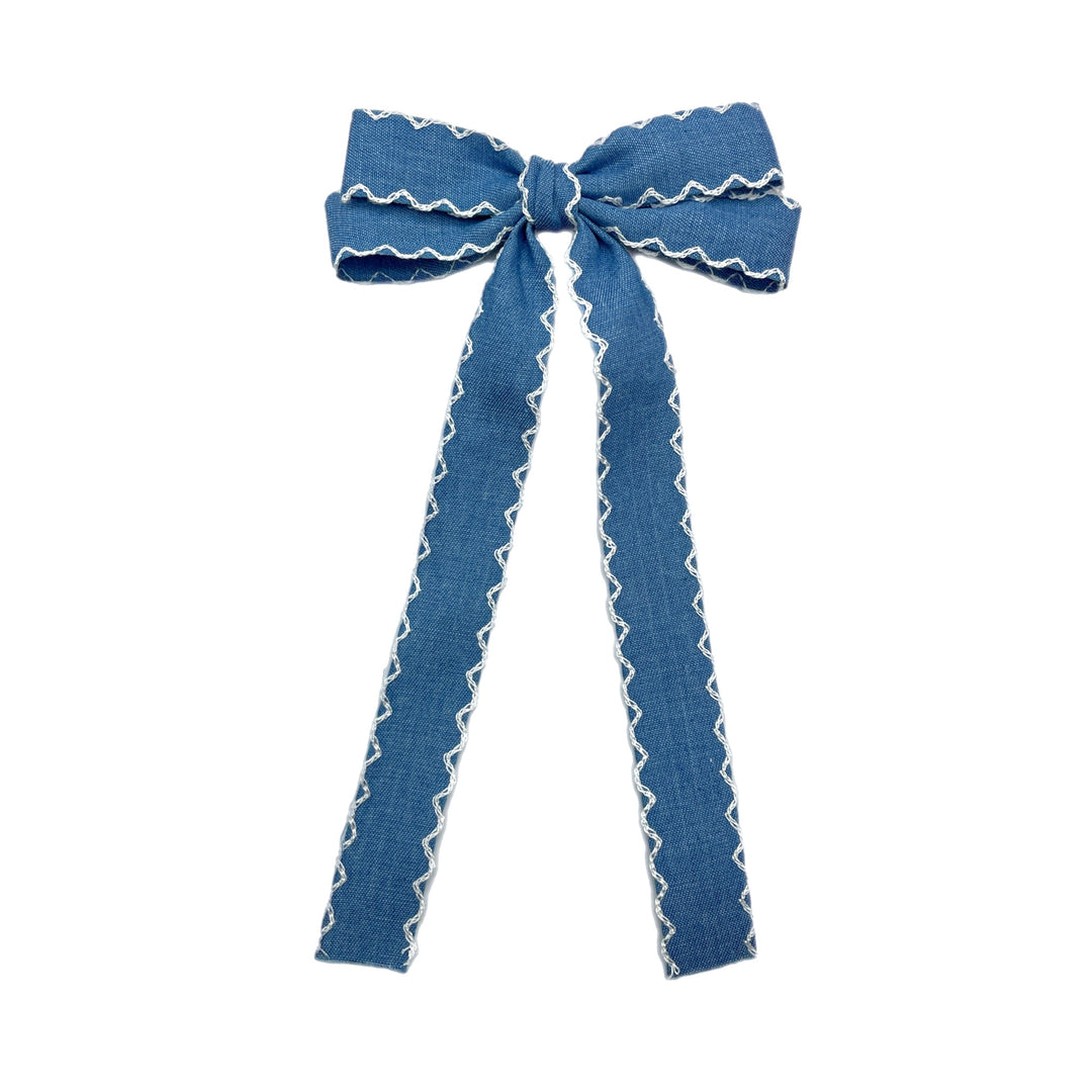 These denim long tail pre-cut tied bows are ready to package and resell to your customers no sewing or measuring necessary! These hair bows come with a alligator clip already attached.