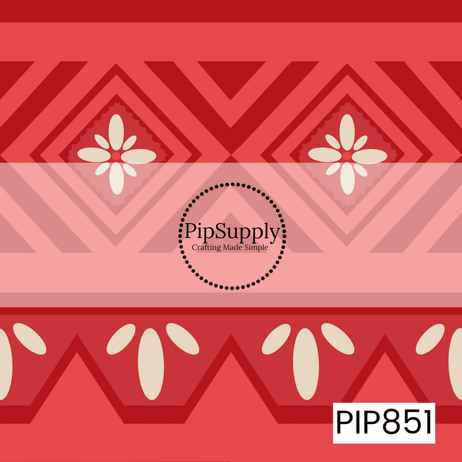 This bold geometric design features layered diamond shapes, chevron patterns, and stylized floral motifs arranged in horizontal bands. Warm shades of coral red, blush pink, and cream create a vibrant tropical-inspired color palette, while the symmetrical layout gives the pattern a clean and structured look. Decorative floral elements nestled within the diamonds add a soft, handcrafted touch, blending island-inspired charm with modern geometric design.
