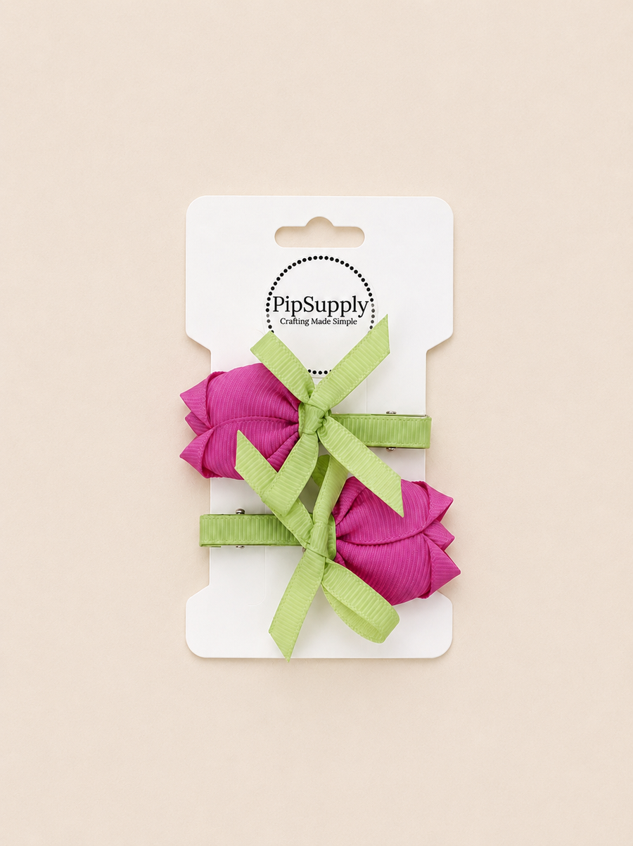 Two pink hair bows with green ribbons on a hair clip in the shape of a tulip flower. size is approximately 2.25"
