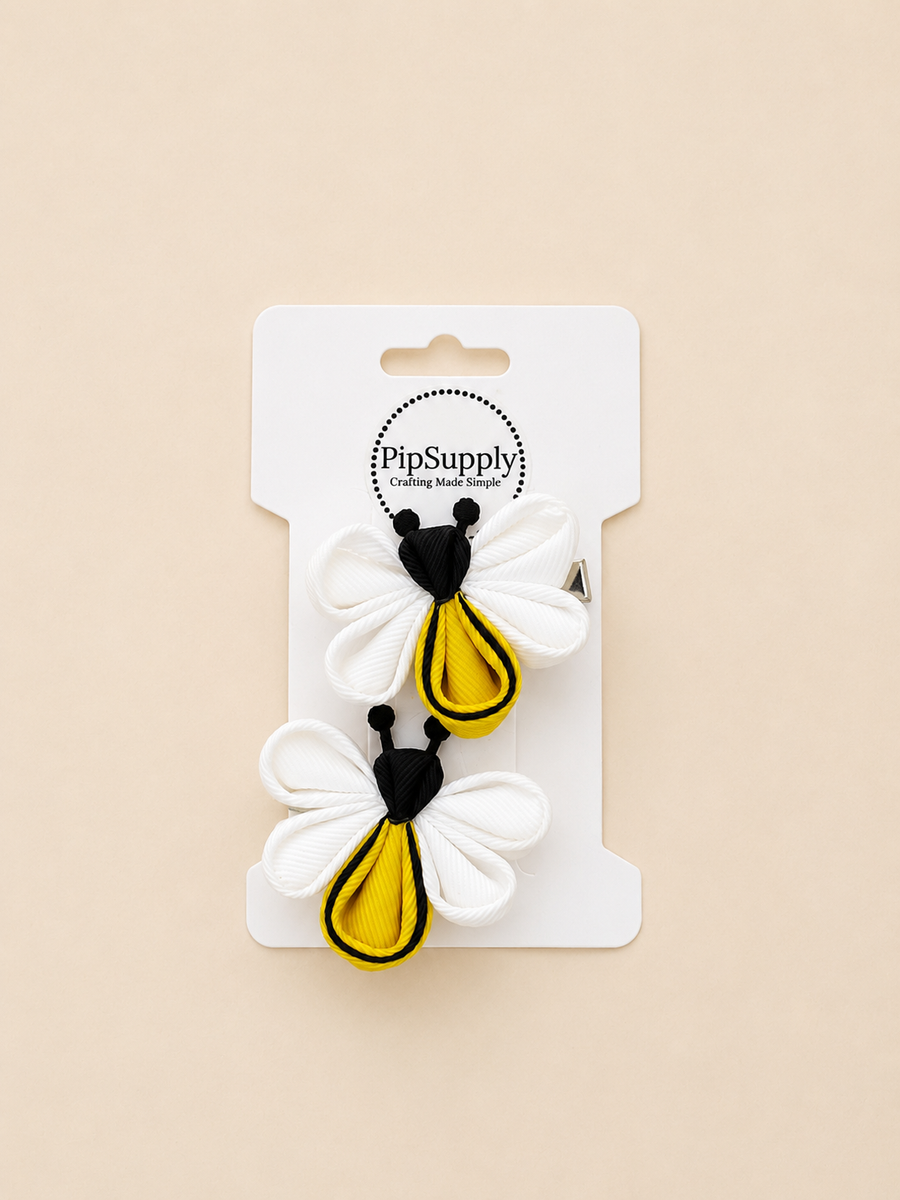 Set of bee-shaped hair clips, sized approximately 2"
