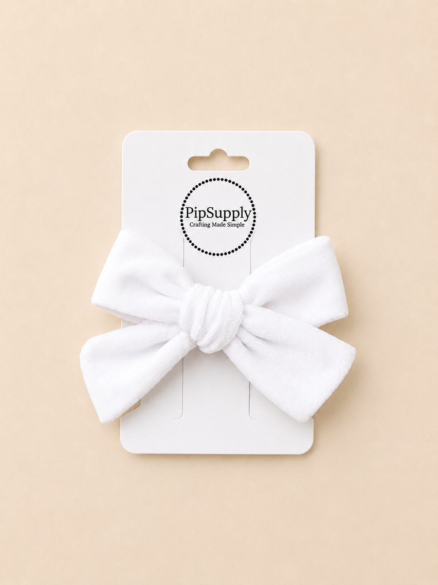 White velvet hair bow sized approximately 3.5"