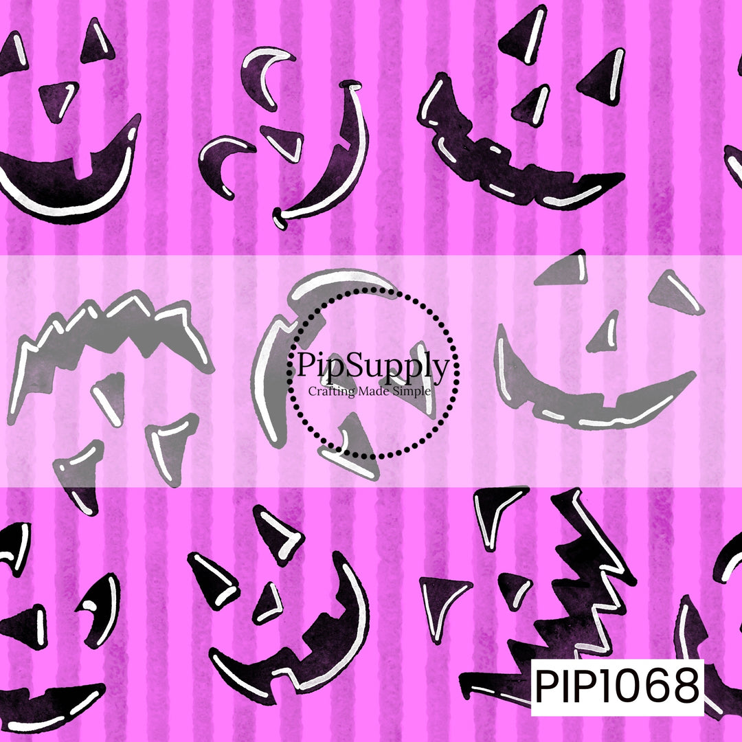 A playful Halloween pattern featuring scattered jack-o'-lantern faces in a hand-painted watercolor style across a bright pink background with soft purple vertical stripes. The smiling and spooky pumpkin expressions, paired with bold black details and white highlights, create a fun, whimsical design with a festive Halloween feel.
