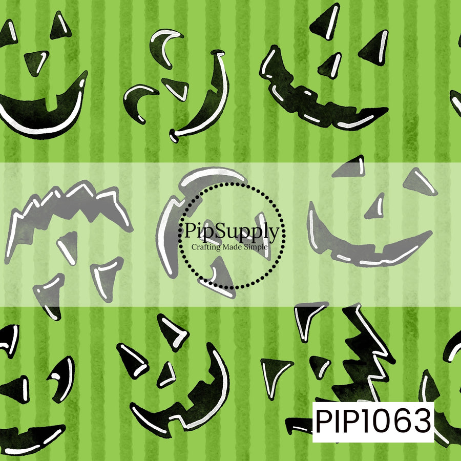 A playful seamless pattern featuring scattered jack-o'-lantern faces on a bright lime green striped background. The smiling pumpkin expressions and textured vertical stripes create a fun, festive design with a whimsical Halloween feel.
