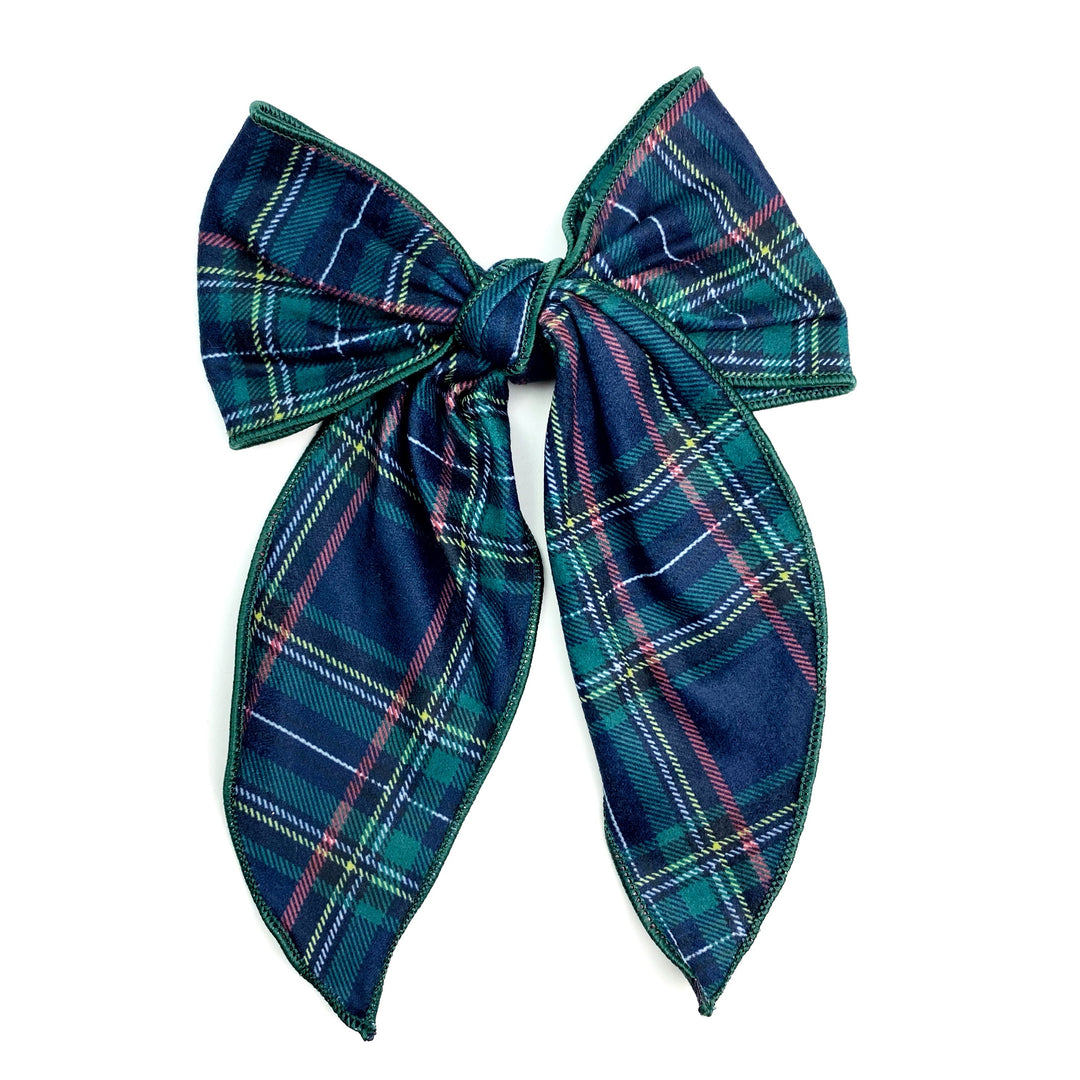 Theses holiday flannel plaid serged edge hair bows are ready to package and resell to your customers no sewing or measuring necessary! These come pre-tied with an attached clip. These Christmas bows are perfect for all hair styles for kids and adults.