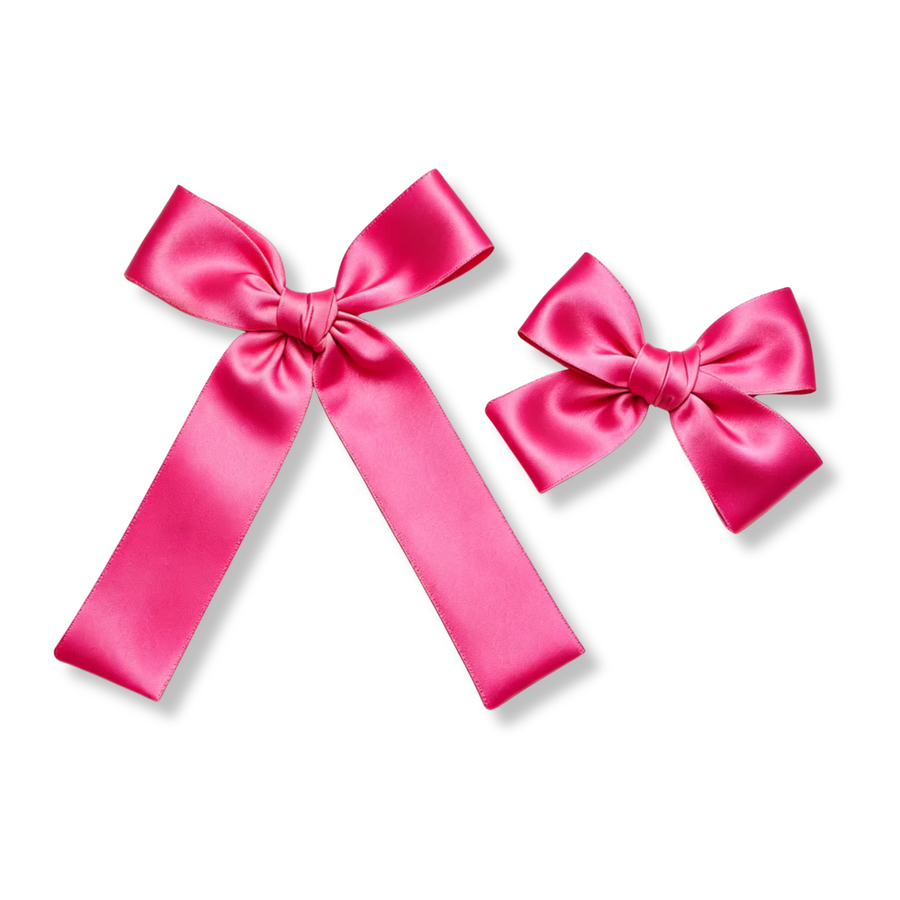 A classic satin bow crafted from vibrant hot pink ribbon with a smooth, glossy finish. Featuring beautifully shaped loops, a neatly wrapped center knot, and elegant tails, this timeless design adds a bold pop of color and effortless charm to any hairstyle.

Small Bow Sizing 4.5" x 4.5"
Large Bow Sizing 5.5" x 7"

