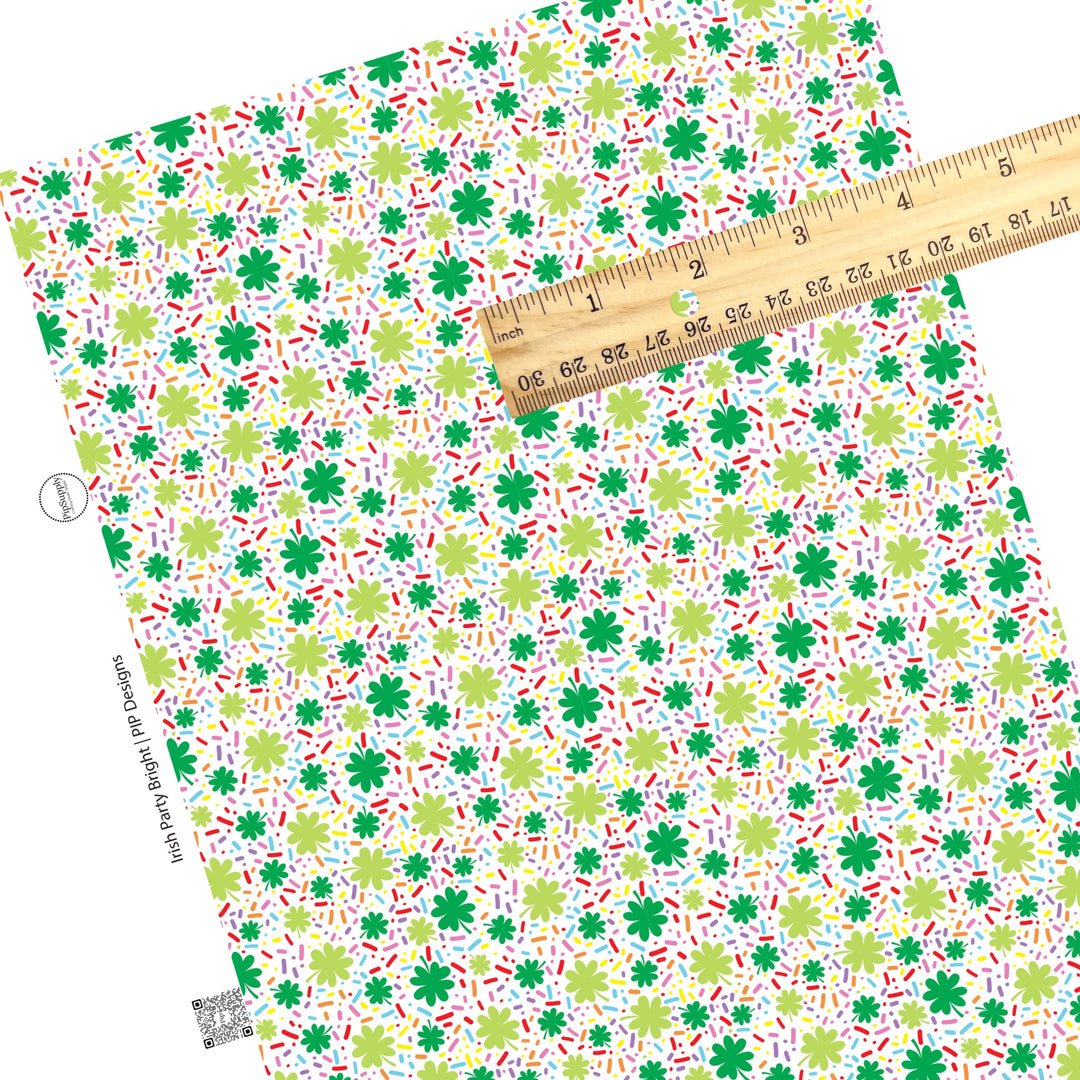 These St. Patrick's Day pattern themed faux leather sheets contain the following design elements: St. Patrick's Day green shamrocks surrounded by colorful celebration dots on white. Our CPSIA compliant faux leather sheets or rolls can be used for all types of crafting projects.