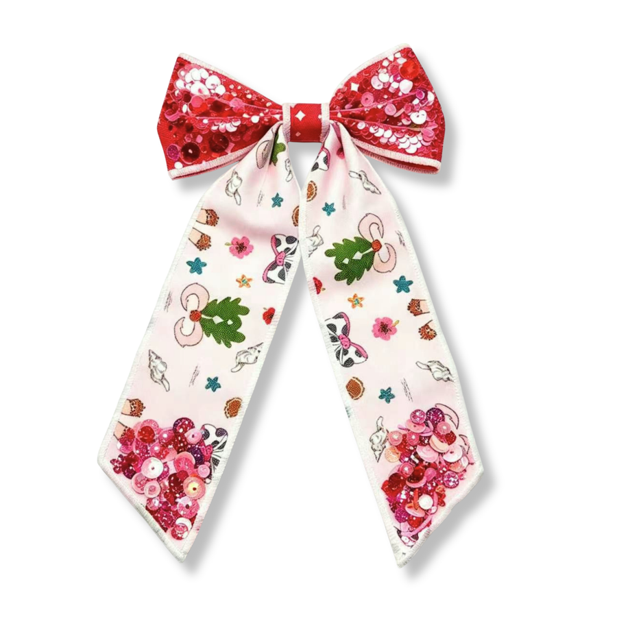 This eye-catching shaker bow features a white ribbon printed with whimsical coastal-inspired designs, including seashells, bows, flowers, starfish, acorns, and playful decorative accents. The bow is accented with bold red shaker sections filled with sparkling red sequins across the top loops, while additional red sequin clusters embellish the pointed ends of the tails for extra dimension and shine.
Bow Sizing 5" x 8.5"