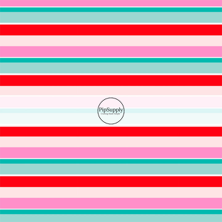 These holiday pattern themed fabric by the yard features light pink, white, teal, and red stripes. This fun Christmas fabric can be used for all your sewing and crafting needs!