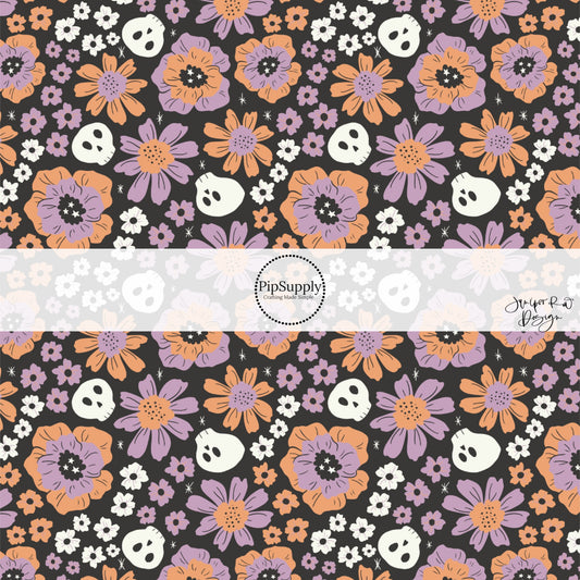 White skeletons and purple and orange floral prints on black fabric by the yard.