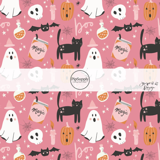Pink fabric by the yard with ghosts, pumpkins, black cats, and spiderwebs.