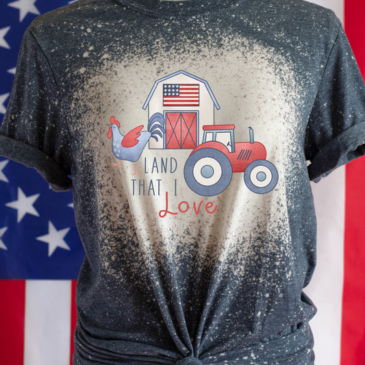 red white blue farm tractor and barn with words land that I love iron on transfer