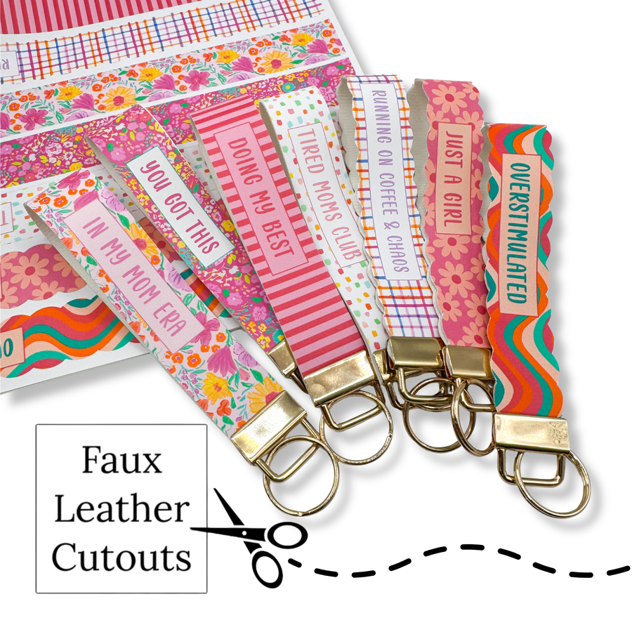 Colorful faux leather cutouts with text and keychains on a white background