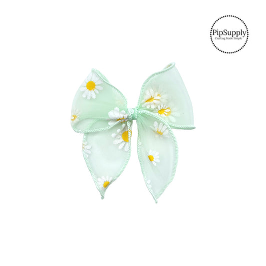 These pastel colored daisy tulle bow strips are ready to package and resell to your customers no sewing or measuring necessary! These come pre-tied, just attach to a clip or headband. The floral design features white daisies perfect for spring. 
