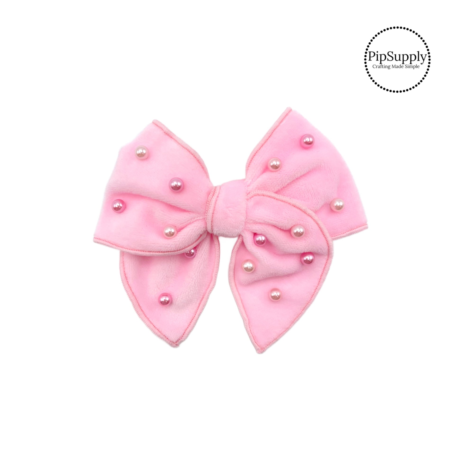 These light pink velvet pre-cut bow strips are ready to package and resell to your customers no sewing or measuring necessary! These hair bows come with a alligator clip already attached. The pearls are hand stitched on the light pink velvet hair bow.