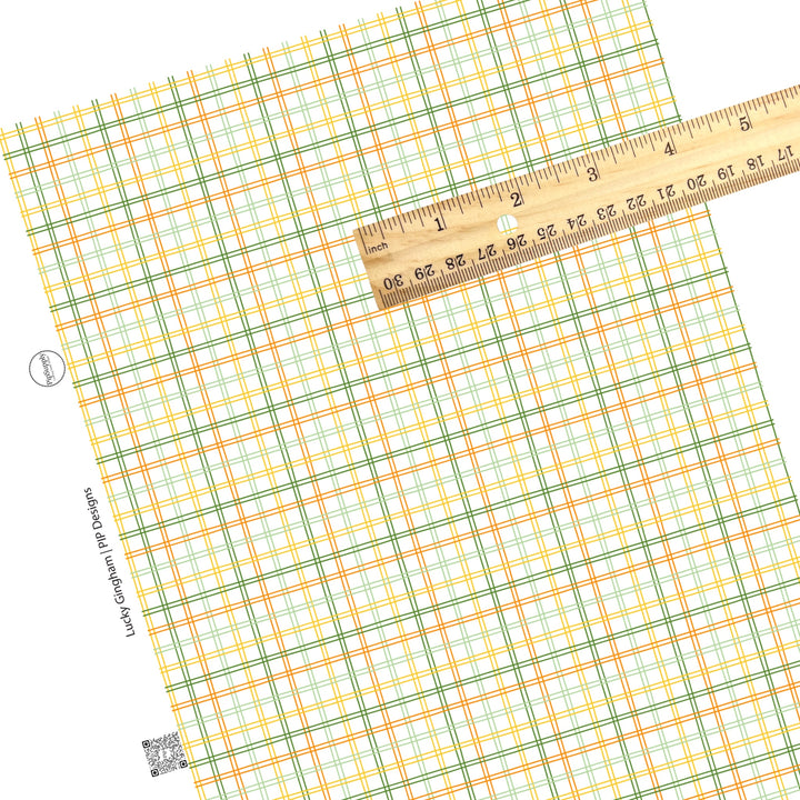 These St. Patrick's Day pattern themed faux leather sheets contain the following design elements: green, yellow, and orange gingham pattern. Our CPSIA compliant faux leather sheets or rolls can be used for all types of crafting projects.