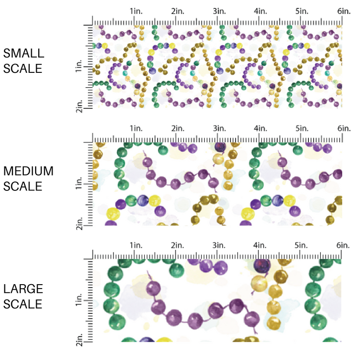 White fabric by the yard scaled image guide with yellow, purple, and green Mardi Gras beads.