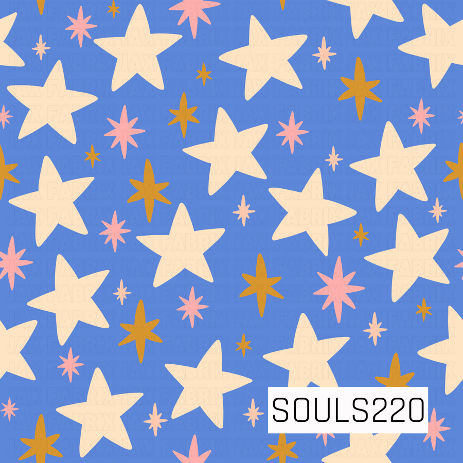 A playful retro star pattern featuring oversized, slightly irregular cream stars scattered across a bright periwinkle blue background. Smaller mid-century inspired starbursts are mixed throughout in bubblegum pink, peach, and warm golden mustard, with varying shapes and sizes creating a fun hand-drawn look. The bold scale, whimsical shapes, and vintage color palette give the design a cheerful retro feel.