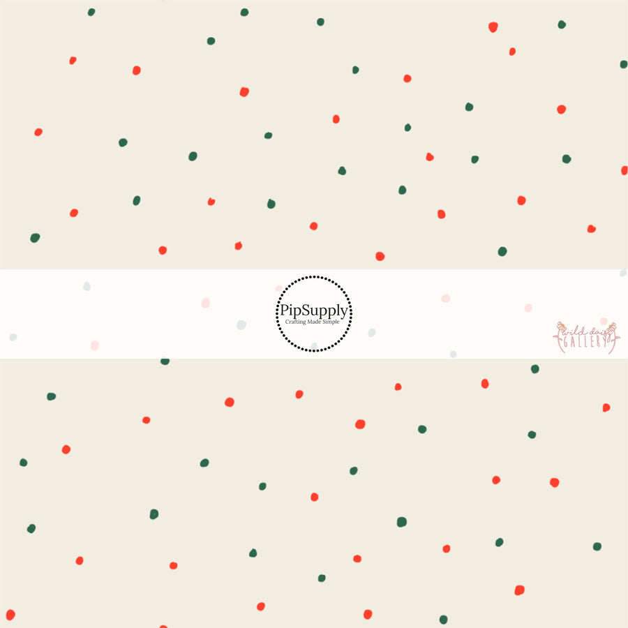 Cream fabric by the yard with red and green speckled dots.