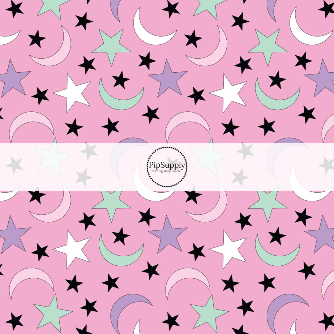 These Halloween themed pattern fabric by the yard features the following design elements: colorful stars and moons on light pink. This fun spooky themed fabric can be used for all your sewing and crafting needs!