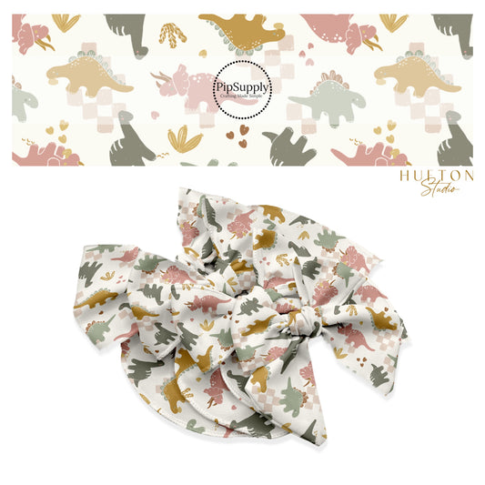 These Valentine's Day pattern themed no sew bow strips can be easily tied and attached to a clip for a finished hair bow. These patterned bow strips are great for personal use or to sell. These bow strips features dusty rose, taupe, and light green dinosaurs surrounded with tiny hearts on ivory.