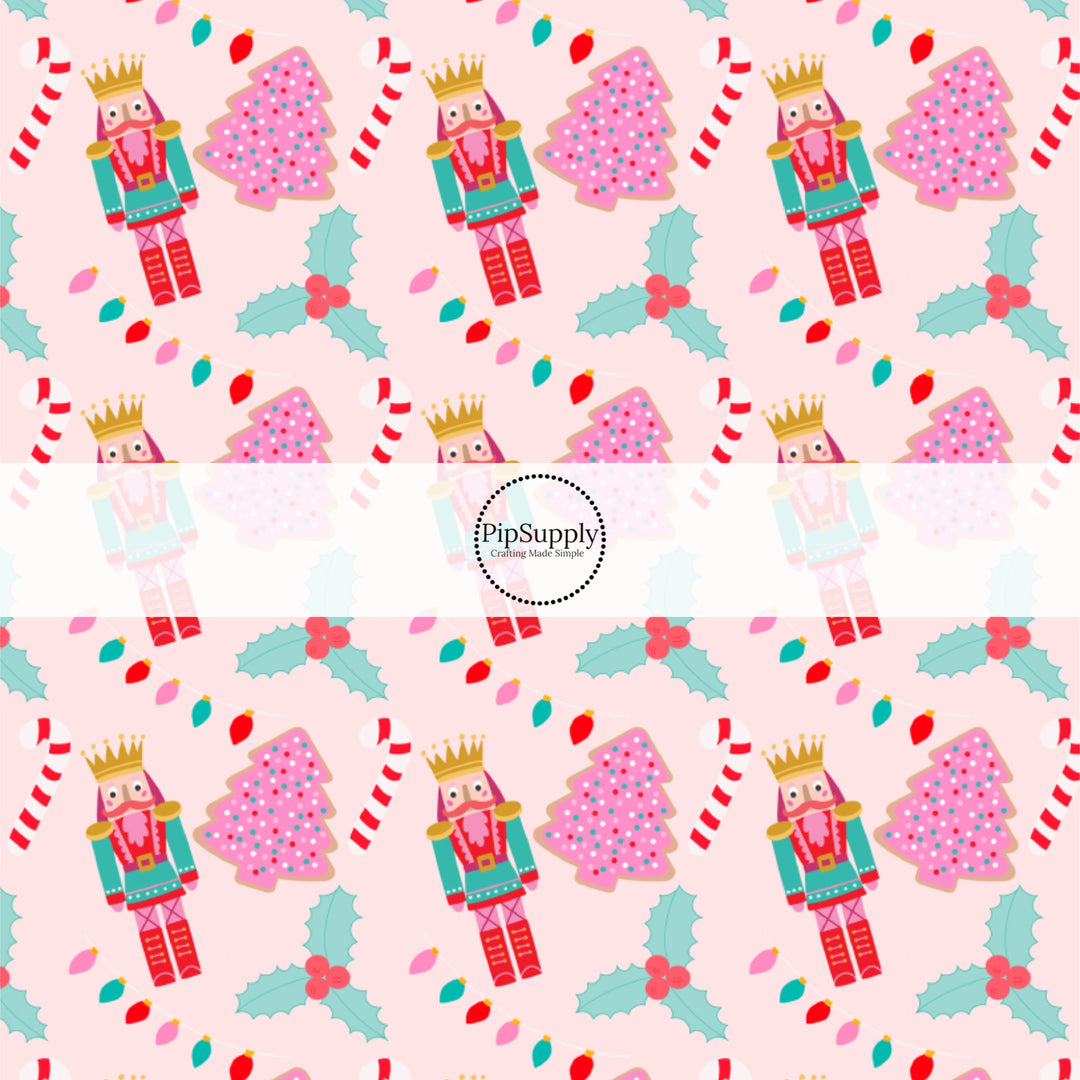 These holiday pattern themed fabric by the yard features Nutrcrackers and Christmas cookies on light pink. This fun Christmas fabric can be used for all your sewing and crafting needs!