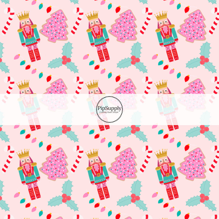 These holiday pattern themed fabric by the yard features Nutrcrackers and Christmas cookies on light pink. This fun Christmas fabric can be used for all your sewing and crafting needs!