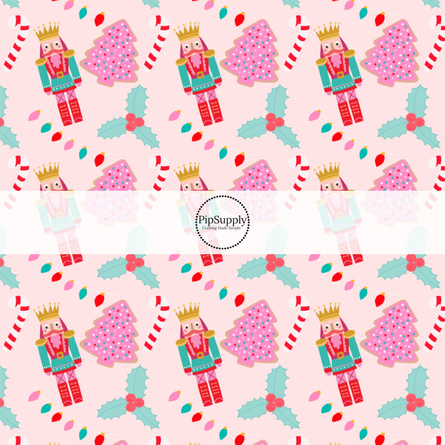 These holiday pattern themed fabric by the yard features Nutrcrackers and Christmas cookies on light pink. This fun Christmas fabric can be used for all your sewing and crafting needs!