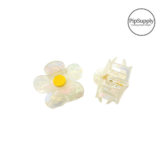 These daisy iridescent claw clips are a stylish hair accessory and are perfect for a spring up-do hairstyle. These acrylic clips come with a jaw clip already attached. These shimmer hair clips are ready to wear or to sell to others. 