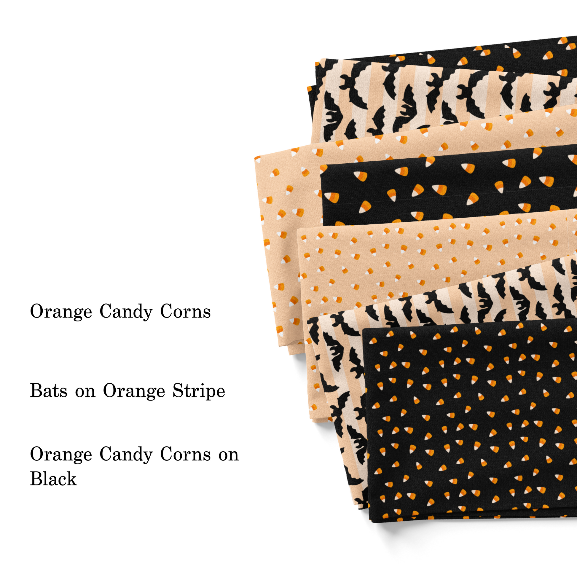 Black and orange Halloween fabric swatches with candy corn and bats.