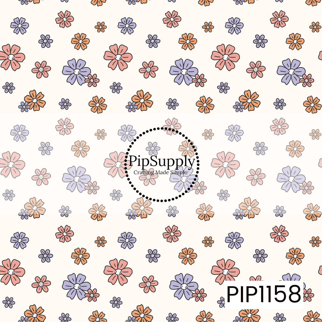 A retro floral pattern featuring hand-drawn flowers in coral pink, lavender, and orange on a warm cream background. The mix of scattered blooms and playful shapes gives it a sweet vintage feel.
