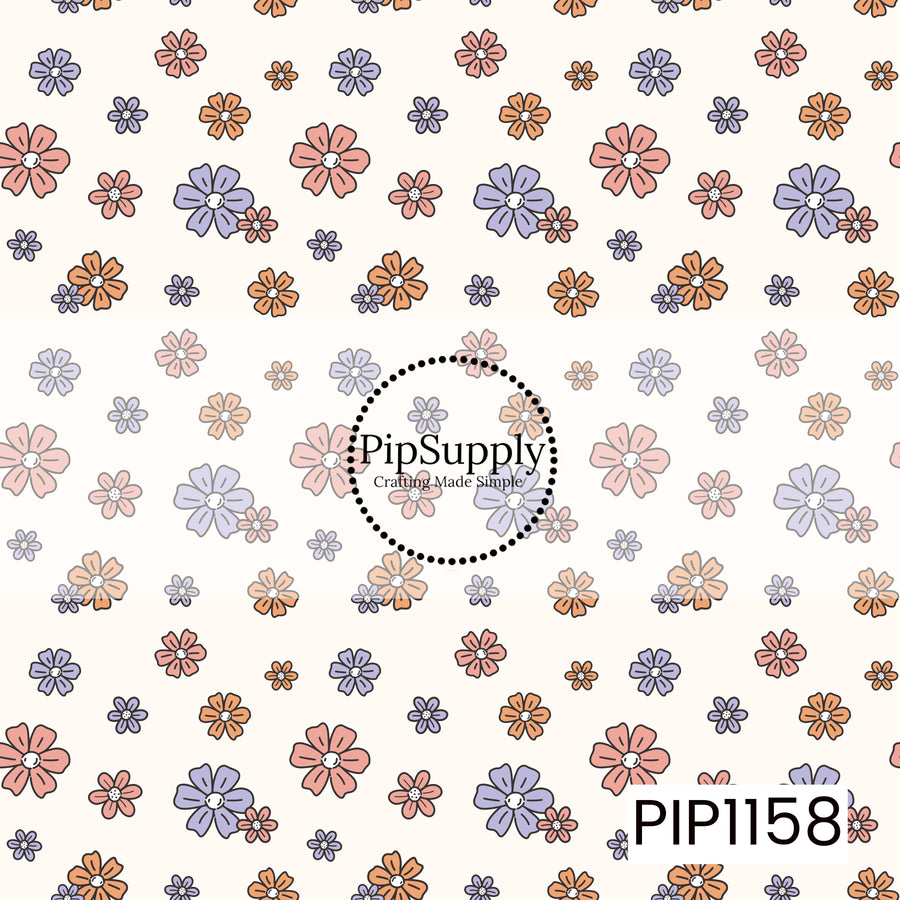 A retro floral pattern featuring hand-drawn flowers in coral pink, lavender, and orange on a warm cream background. The mix of scattered blooms and playful shapes gives it a sweet vintage feel.
