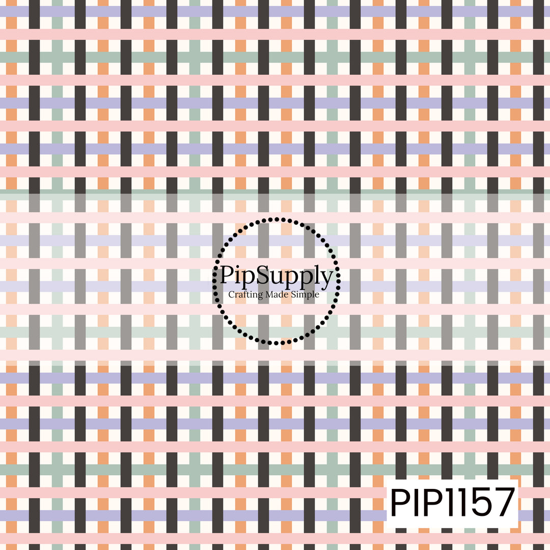 A playful woven plaid pattern featuring black, blush pink, orange, lavender, sage green, and cream. The overlapping lines create a fun retro look with a soft Halloween-inspired color palette.
