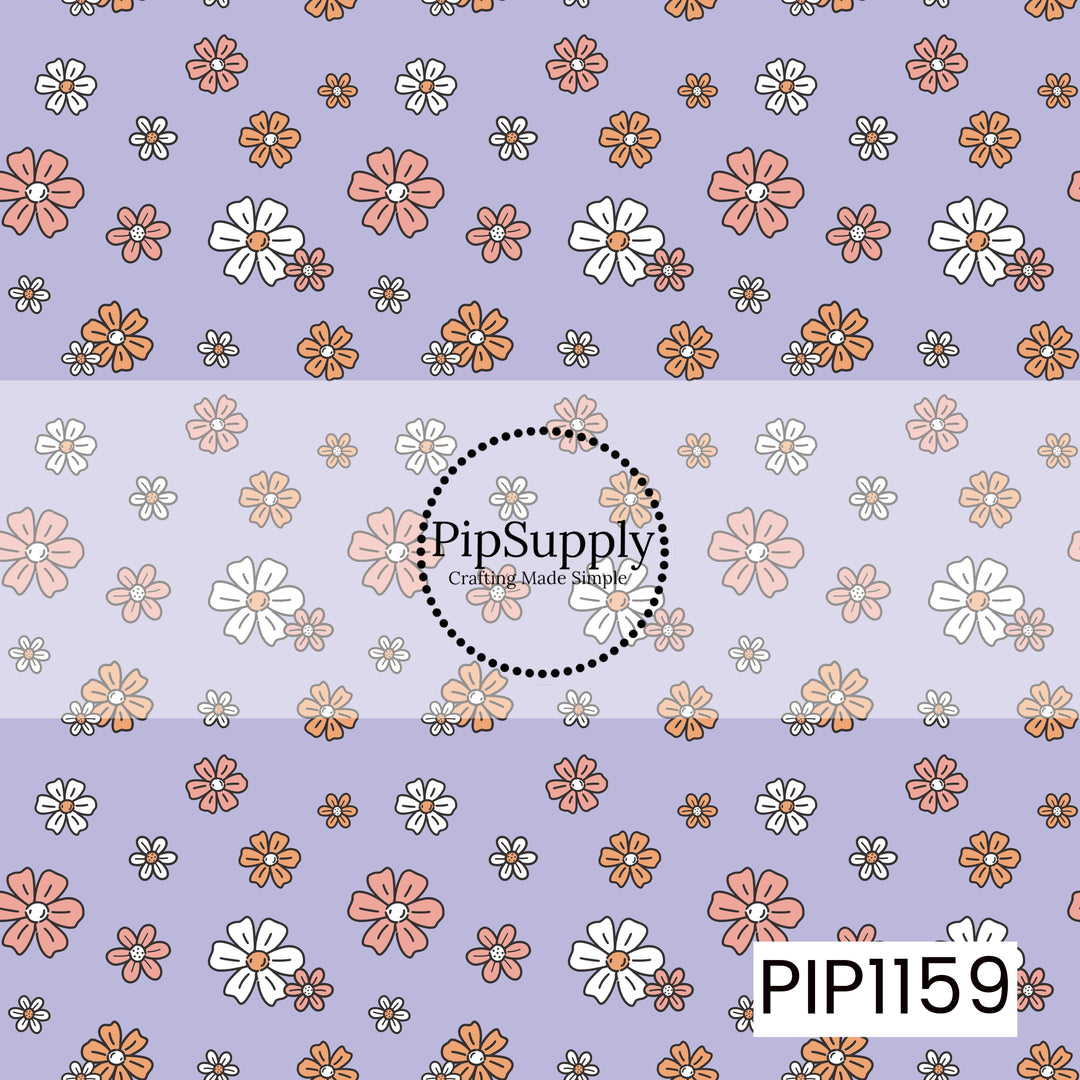 A retro floral pattern featuring coral pink, orange, and white hand-drawn flowers scattered across a soft lavender background. The playful mix of bloom sizes gives it a sweet vintage-inspired look.
