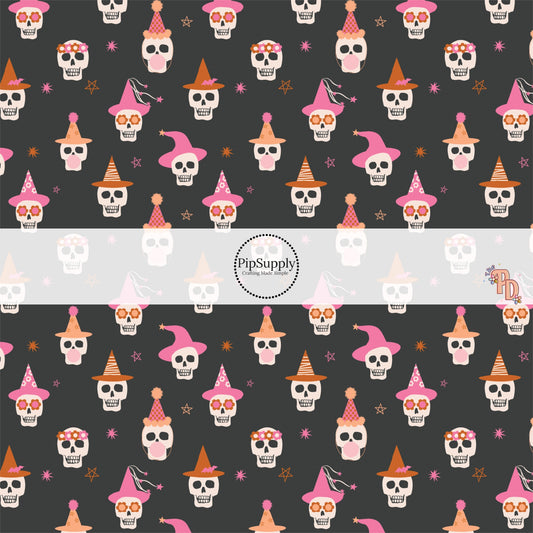 Black fabric by the yard with party skeletons wearing hats.