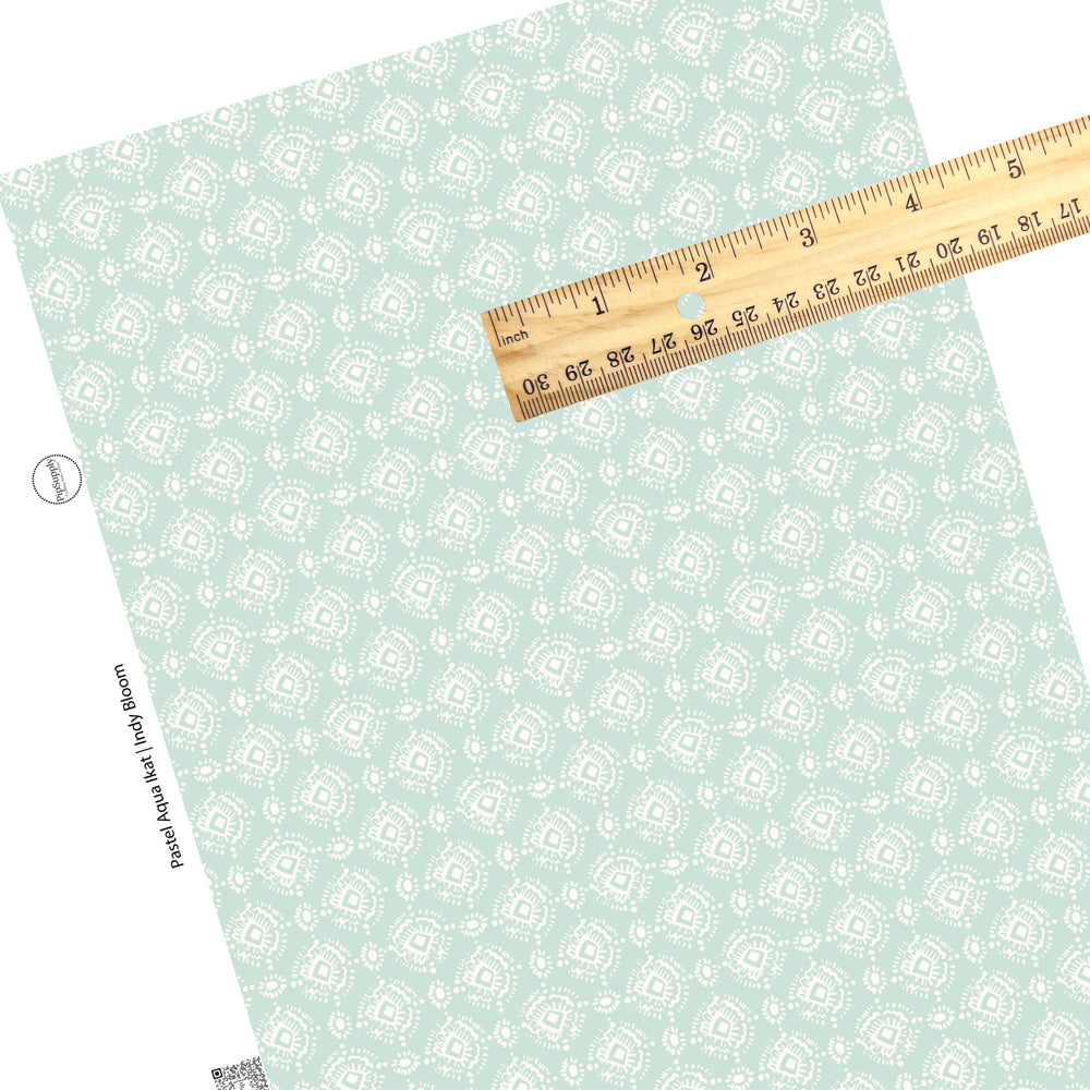 These Valentine's pattern themed faux leather sheets contain the following design elements: ivory ikat pattern on pastel aqua. Our CPSIA compliant faux leather sheets or rolls can be used for all types of crafting projects.