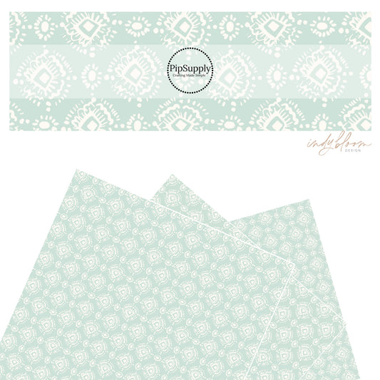 These Valentine's pattern themed faux leather sheets contain the following design elements: ivory ikat pattern on pastel aqua. Our CPSIA compliant faux leather sheets or rolls can be used for all types of crafting projects.