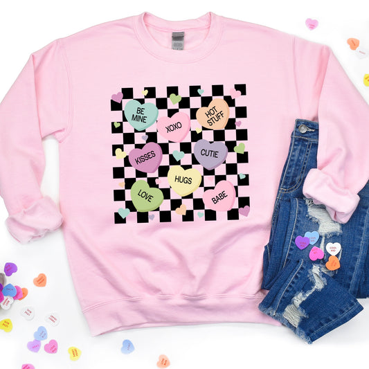 Pastel Conversation Hearts Candies on a Black Checkered Background Iron On Heat Transfer