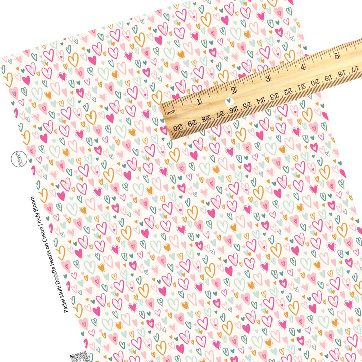 These Valentine's pattern themed faux leather sheets contain the following design elements: pink, aqua, teal, and mustard colored doodle hearts on cream. Our CPSIA compliant faux leather sheets or rolls can be used for all types of crafting projects.