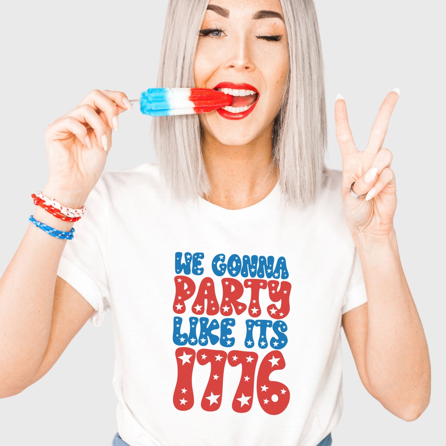 Red and blue "We Gonna Party Like It's 1776" iron on heat transfer with white stars.