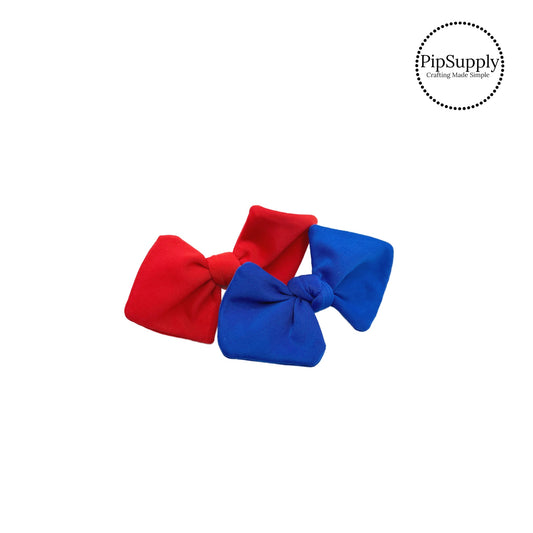 red and royal blue tied swim bows on a hair clip