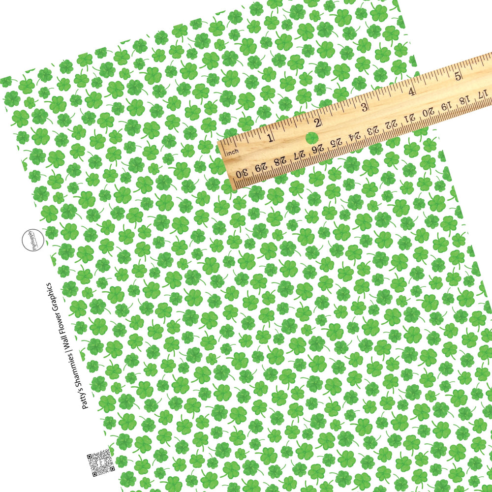 These St. Patrick's Day pattern themed faux leather sheets contain the following design elements: green shamrocks on white. Our CPSIA compliant faux leather sheets or rolls can be used for all types of crafting projects.