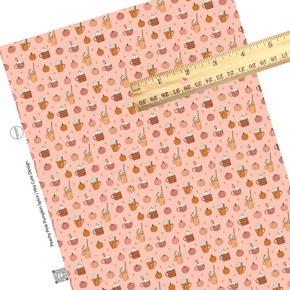 These fall pumpkin themed pink faux leather sheets contain the following design elements: pumpkin spice cups surrounded pumpkins. Our CPSIA compliant faux leather sheets or rolls can be used for all types of crafting projects.