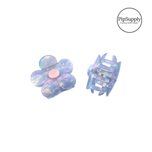 These daisy iridescent claw clips are a stylish hair accessory and are perfect for a spring up-do hairstyle. These acrylic clips come with a jaw clip already attached. These shimmer hair clips are ready to wear or to sell to others. 
