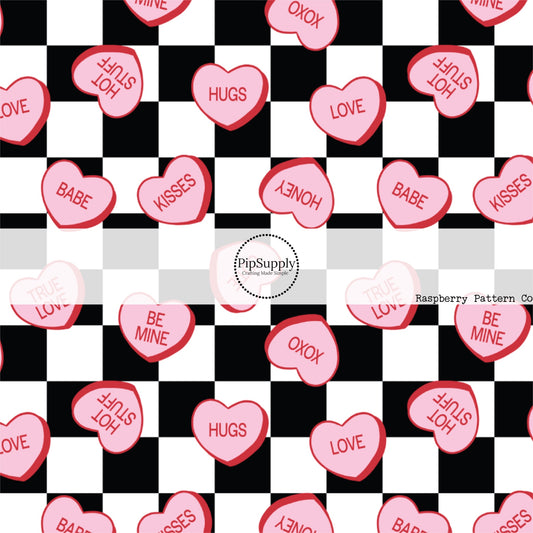 Pink Conversation Heart Candies on Black and White Checkered Fabric by the Yard.