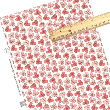 These Valentine's pattern themed faux leather sheets contain the following design elements: red and pink conversation heart mouses on light cream. Our CPSIA compliant faux leather sheets or rolls can be used for all types of crafting projects.