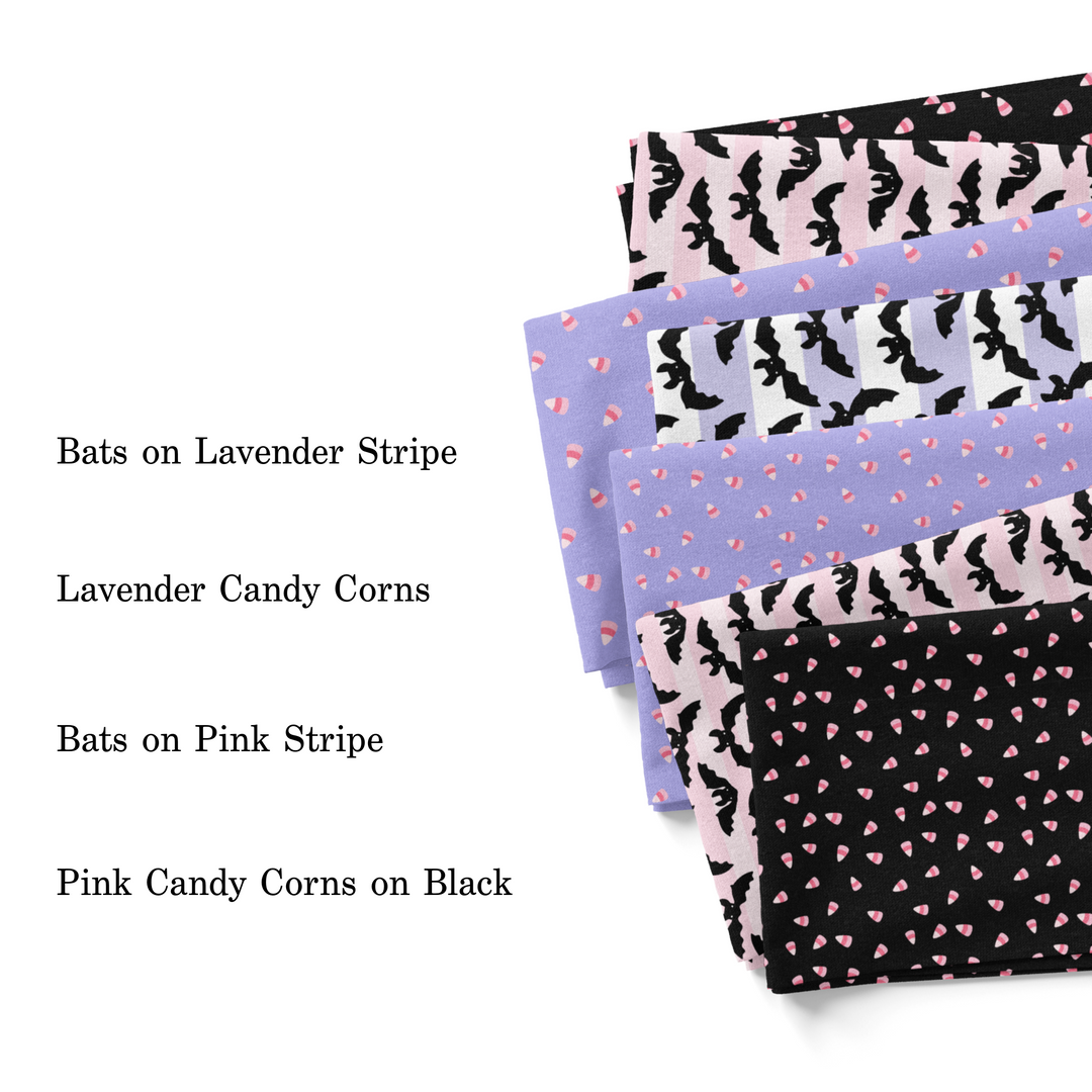 Pink, black, and purple Halloween fabric swatches.