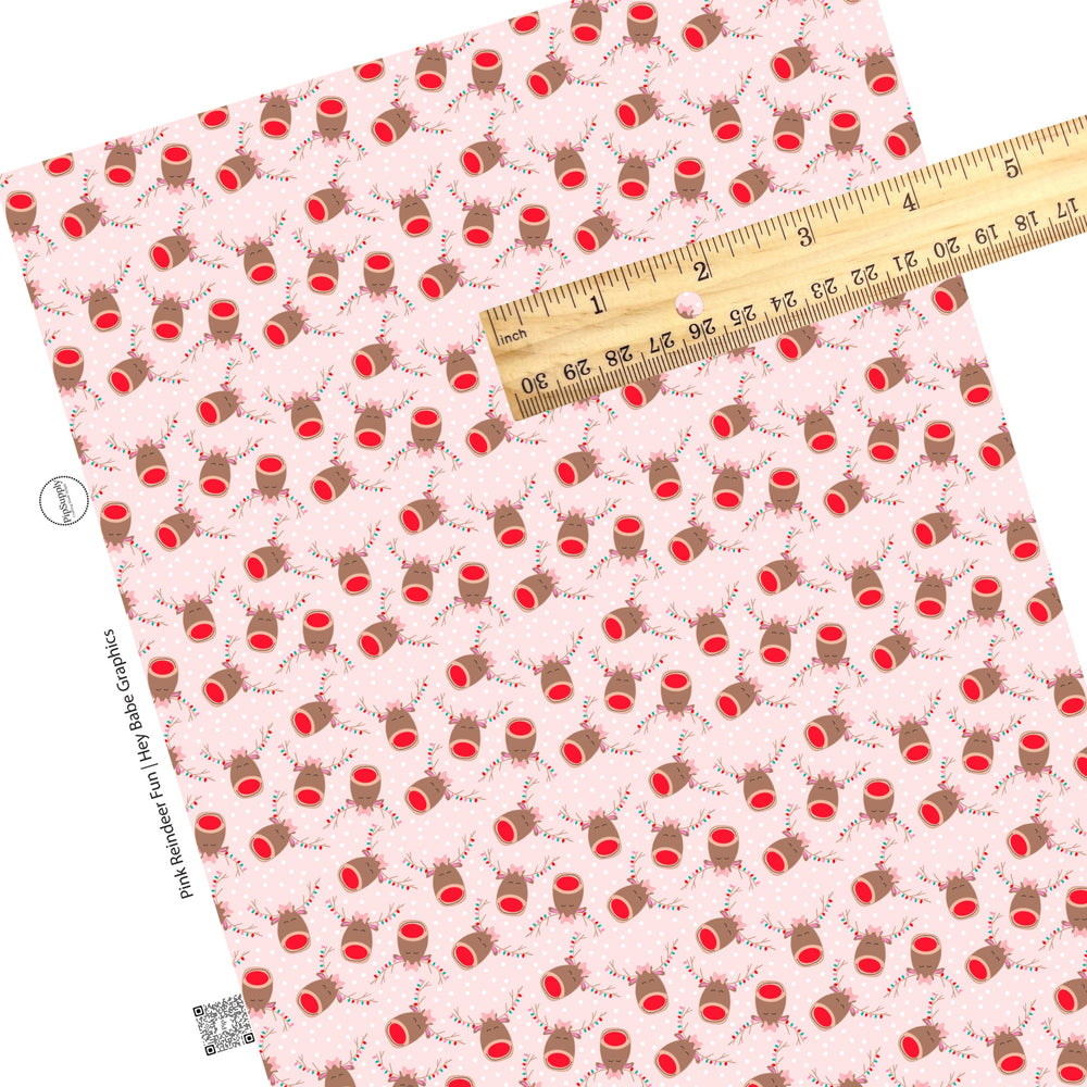 These holiday themed faux leather sheets contain the following design elements: Reindeer with Christmas lights on light pink with small white dots. Our CPSIA compliant faux leather sheets or rolls can be used for all types of crafting projects.